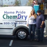Bill Sachs and Kathryn Mills pose in front of one of their Home Pride Chem-Dry vans. Bill expects to save up to $2,500 a month thanks to Chem-Dry's latest technology.
