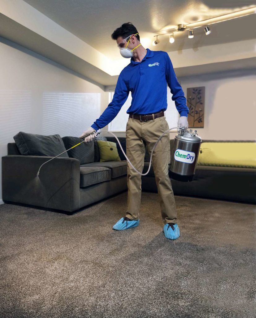 ChemDry versatile floor cleaning franchise employee spray carpet