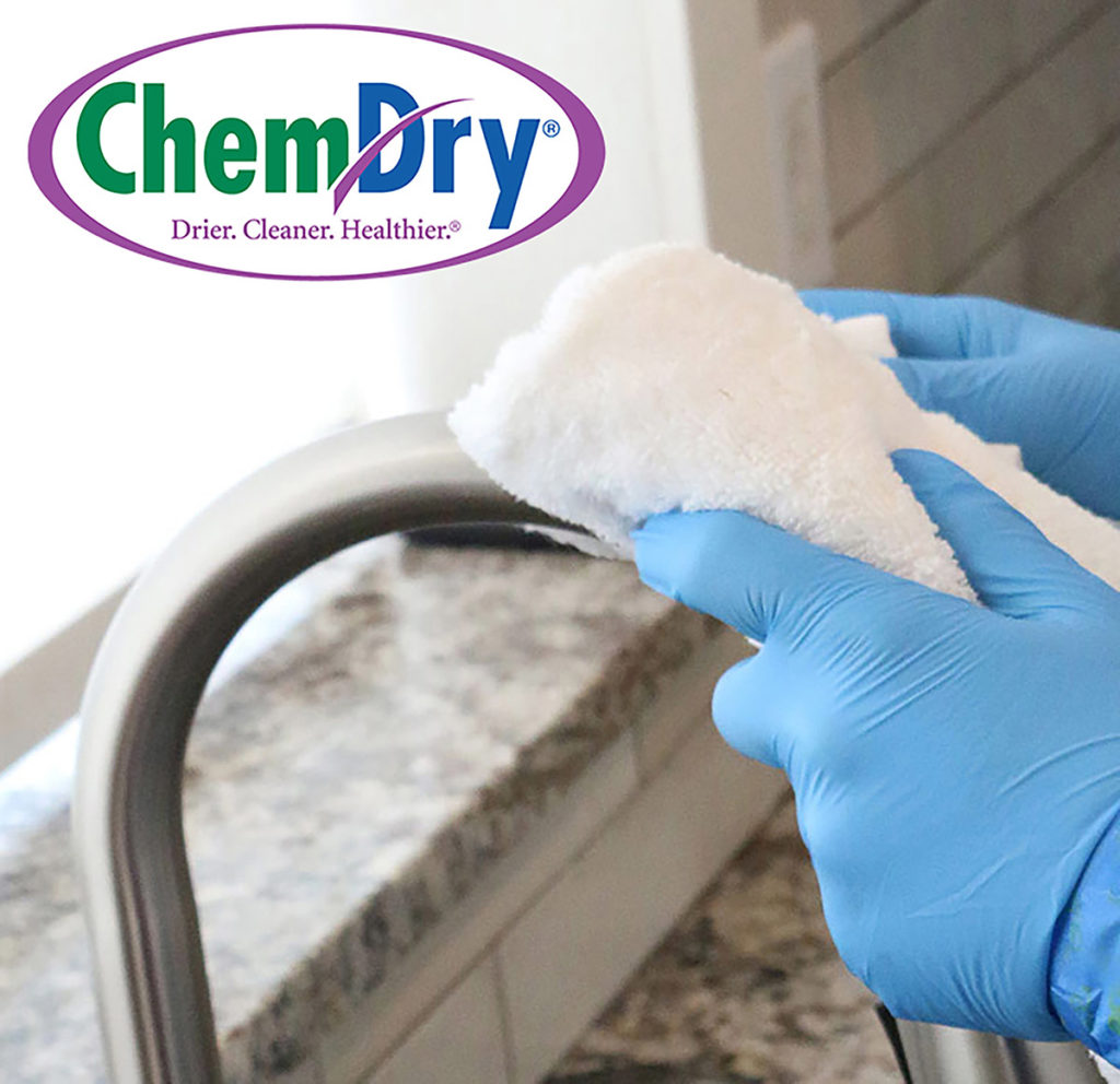 Chem-Dry floor cleaning franchise sanitizing a kitchen faucet top franchise opportunity
