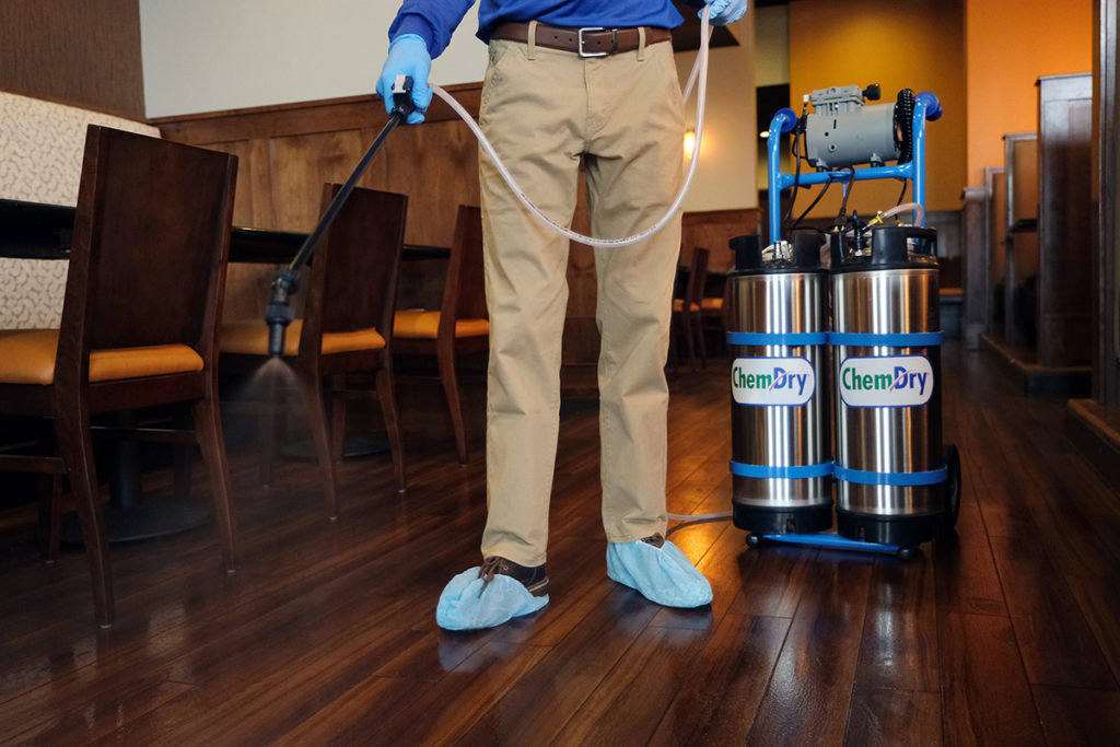 Chem-Dry franchise owner cleans hard wood floor scheduling system